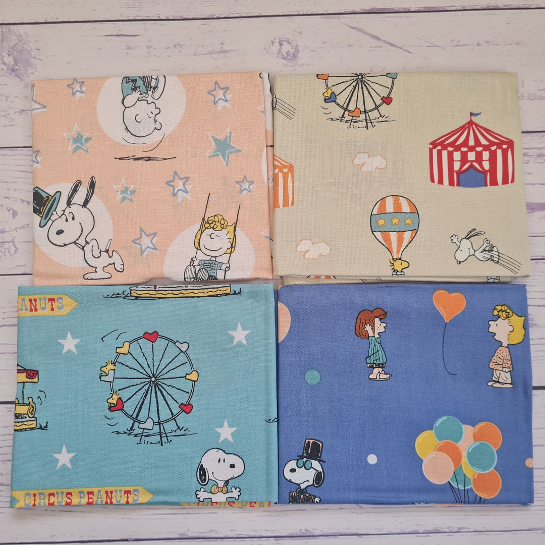 Peanuts and Snoopy Circus bundle of 4 cotton quilting fabrics.