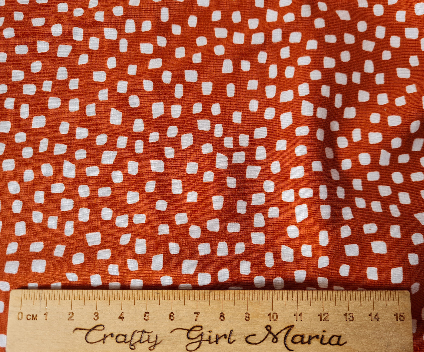 Terracotta Geometric Safari Spot Print Organic Cotton jersey knit fabric by Poppy