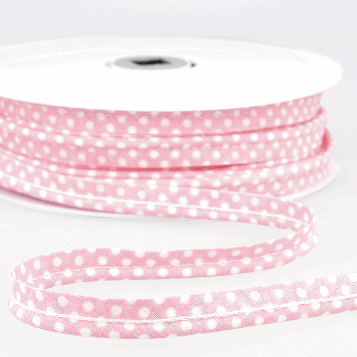 Patterned flanged 10mm wide piping cord trim 2 mm. Floral and polkadot trim. Per Metre
